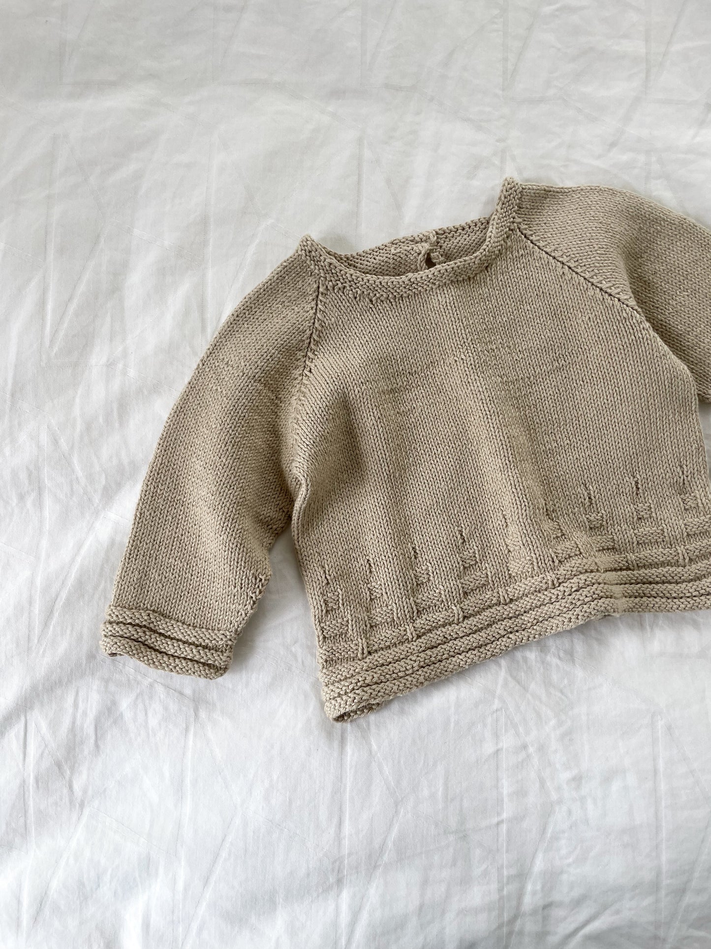 Håndstrikket beige bluse