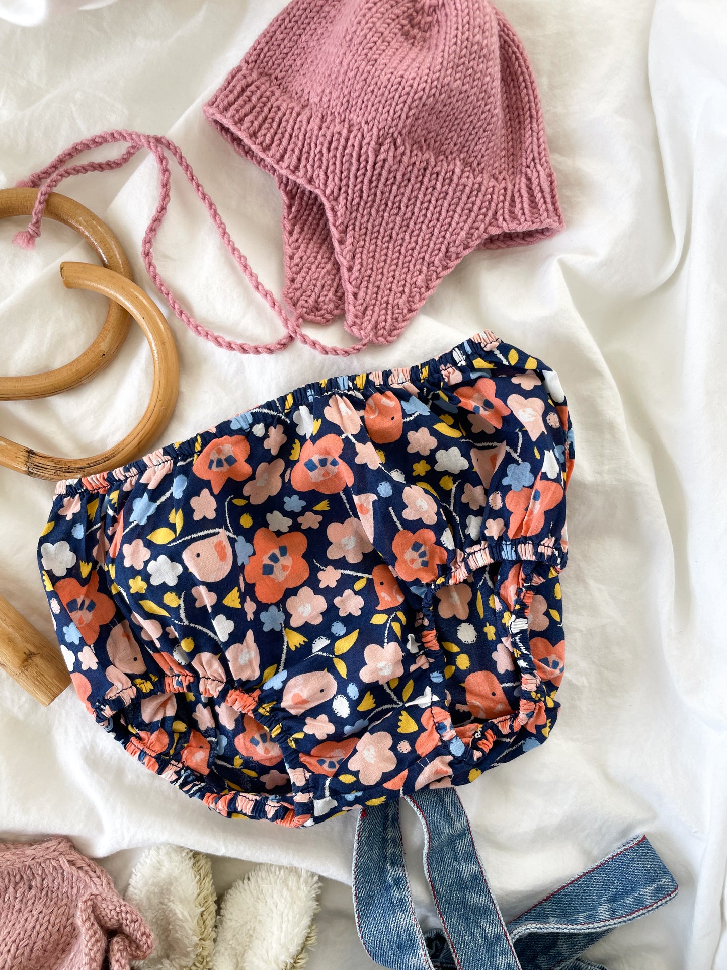 Håndstrikket rosa kyse str. 0-1 mdr