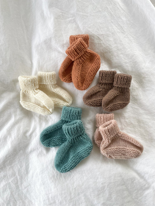 Håndstrikkede futter i Merino, Rosa str. 0-2 mdr