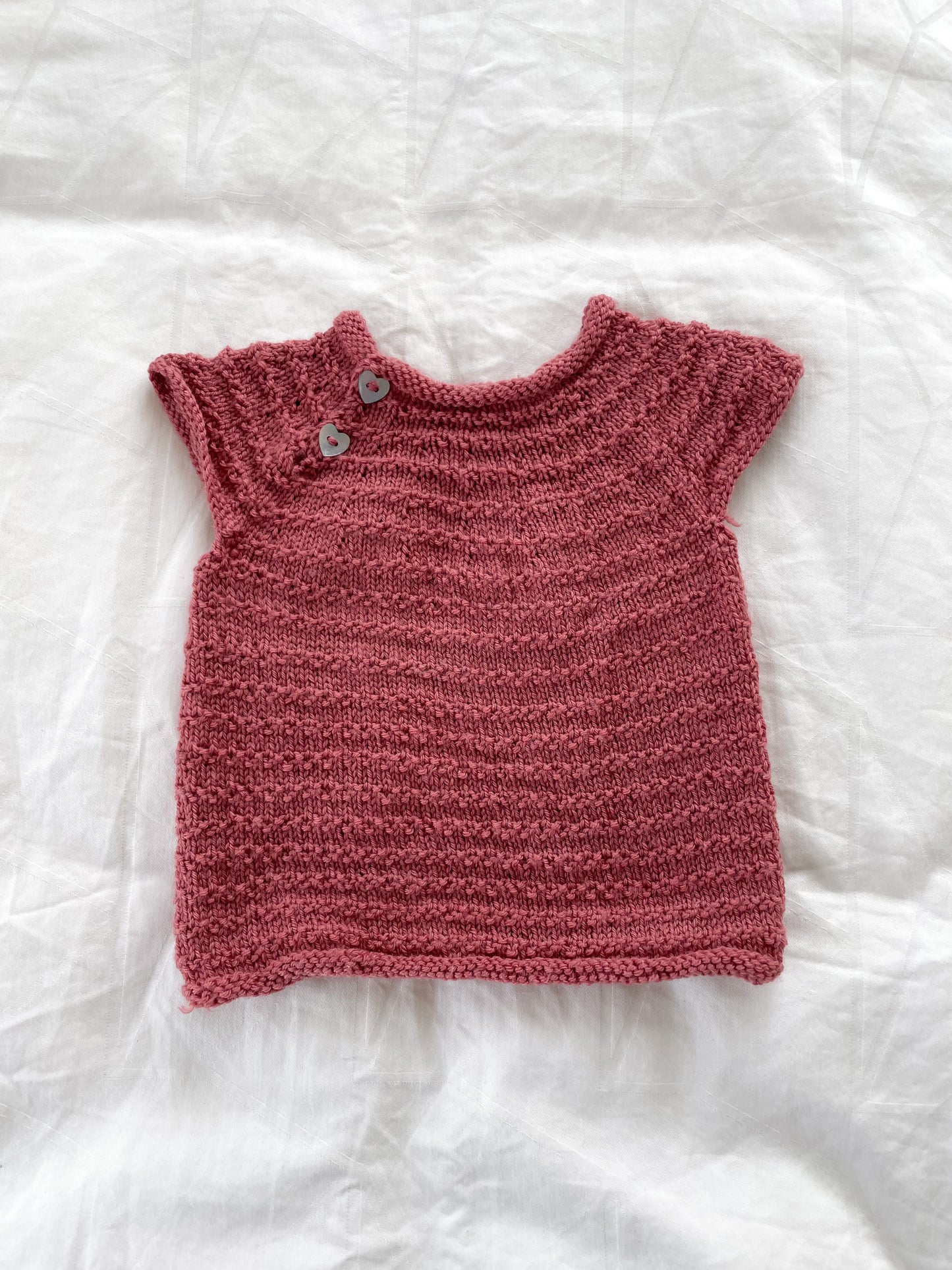 Håndstrikket rosa vest i Merino