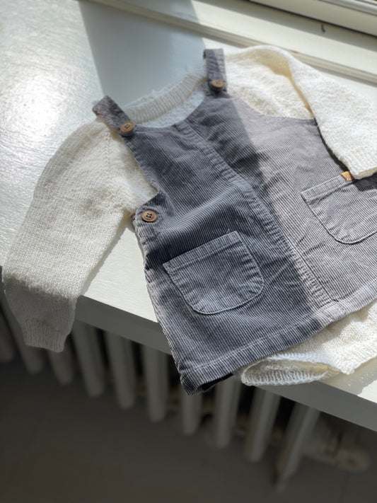 Håndstrikket bodystocking i babyuld
