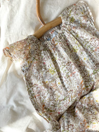 Serendipity romper str. 9-12 mdr