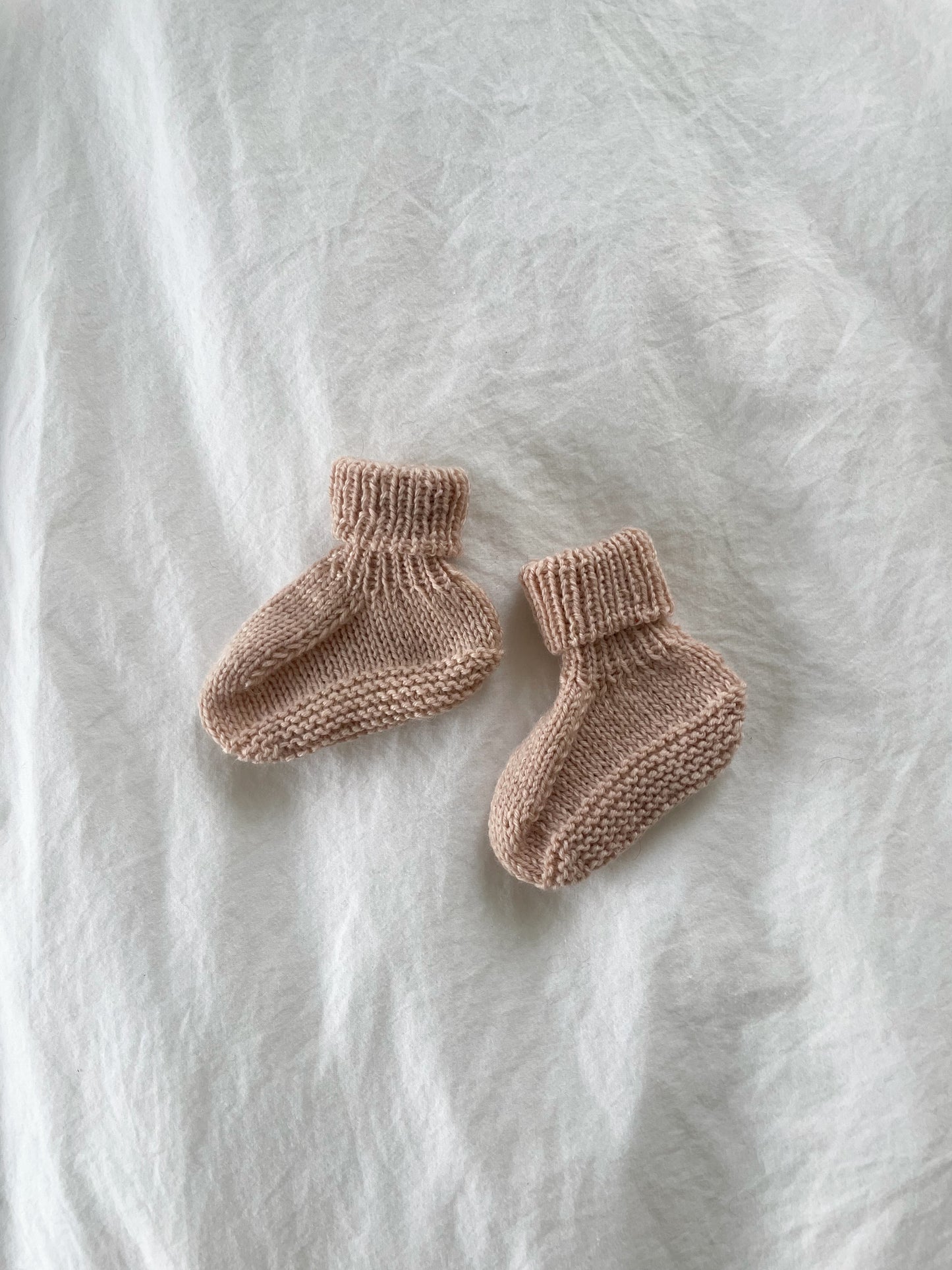 Håndstrikkede futter i Merino, Rosa str. 0-2 mdr