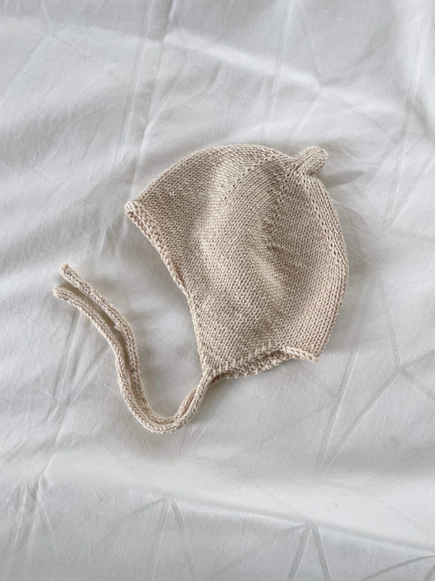 Håndstrikket beige kyse str. 56